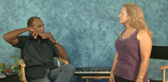 Vocal teacher demonstrating a vocal range exercise